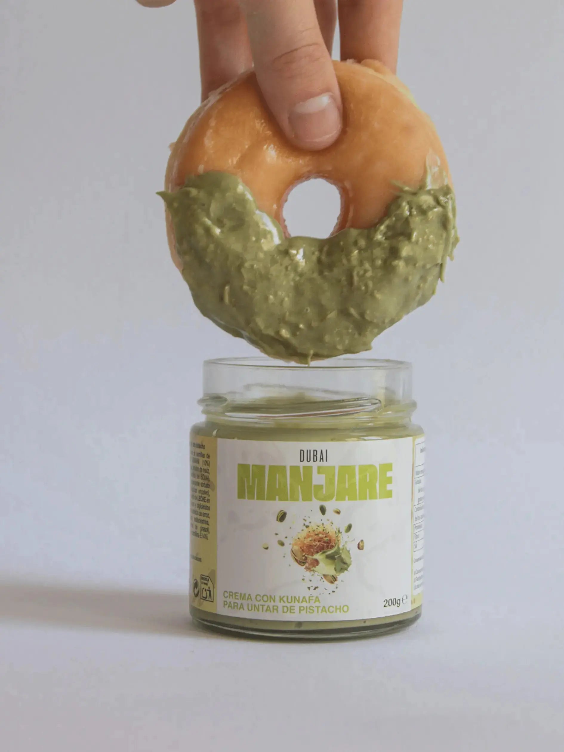 Donut mezclado con MANJARE DUBÁI - CREMA DE PISTACHO DULCE CON KUNAFA 