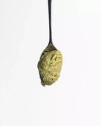 Cuchara con MANJARE CRUNCHY - CREMA DE PISTACHO DULCE CON TROZOS DE PISTACHO 